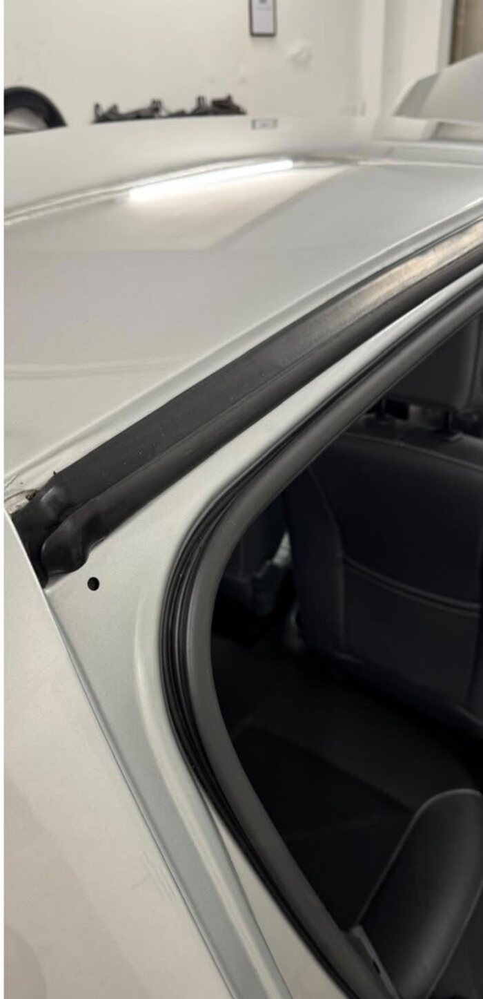 Clean window seal and streak-free paint after auto detailing