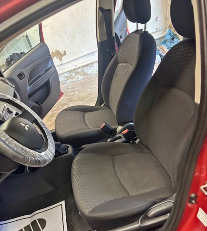 Clean footwell and driver's seat after on-site interior cleaning